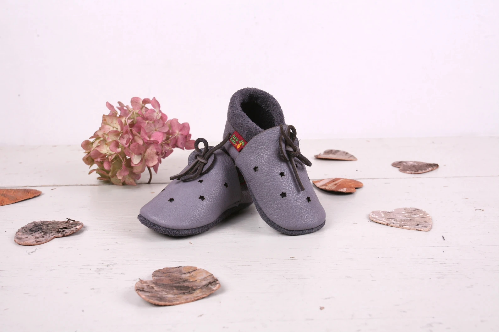Super comfortable baby shoes, ideal for crawling, first steps and children up to 3 years old. Soft soles support natural feet development and barefoot walking. Made of genuine premium, vegetable-tanned leather, safe for child's bare feet. Cute small cuts