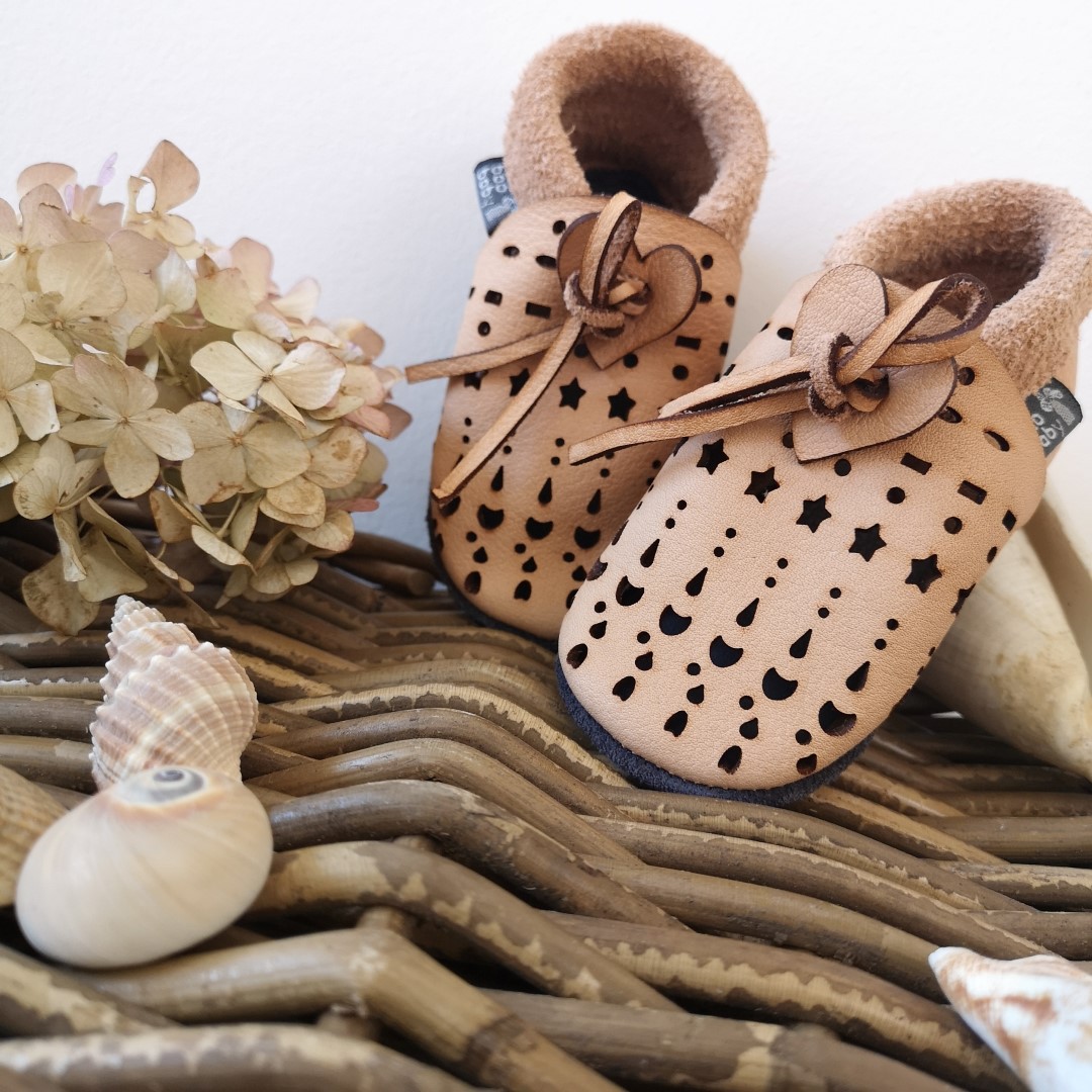 Super comfortable baby shoes, ideal for crawling, first steps and children up to 3 years old. Soft soles support natural feet development and barefoot walking. Made of genuine premium, vegetable-tanned leather, safe for child's bare feet. Cute small cuts 