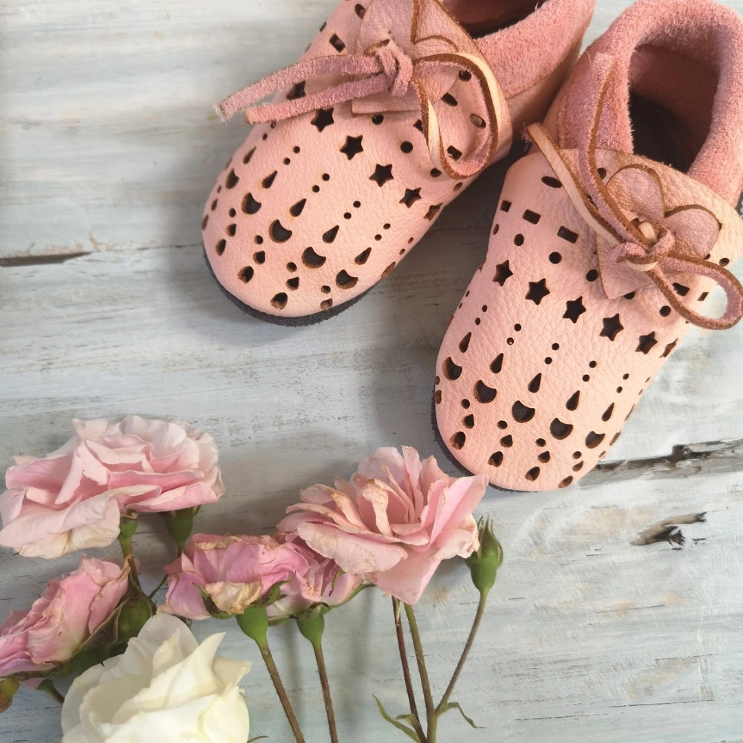 Super comfortable baby shoes, ideal for crawling, first steps and children up to 3 years old. Soft soles support natural feet development and barefoot walking. Made of genuine premium, vegetable-tanned leather, safe for child's bare feet. Cute small cuts