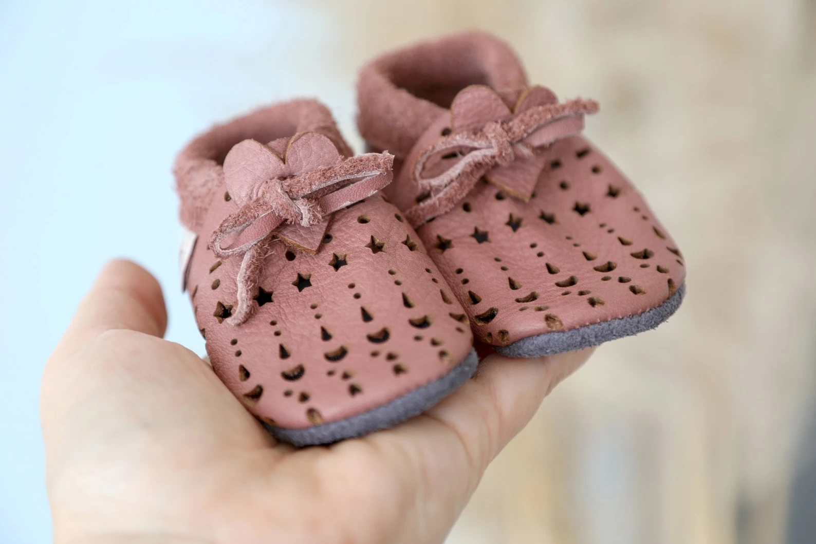 Super comfortable baby shoes, ideal for crawling, first steps and children up to 3 years old. Soft soles support natural feet development and barefoot walking. Made of genuine premium, vegetable-tanned leather, safe for child's bare feet. Cute small cuts