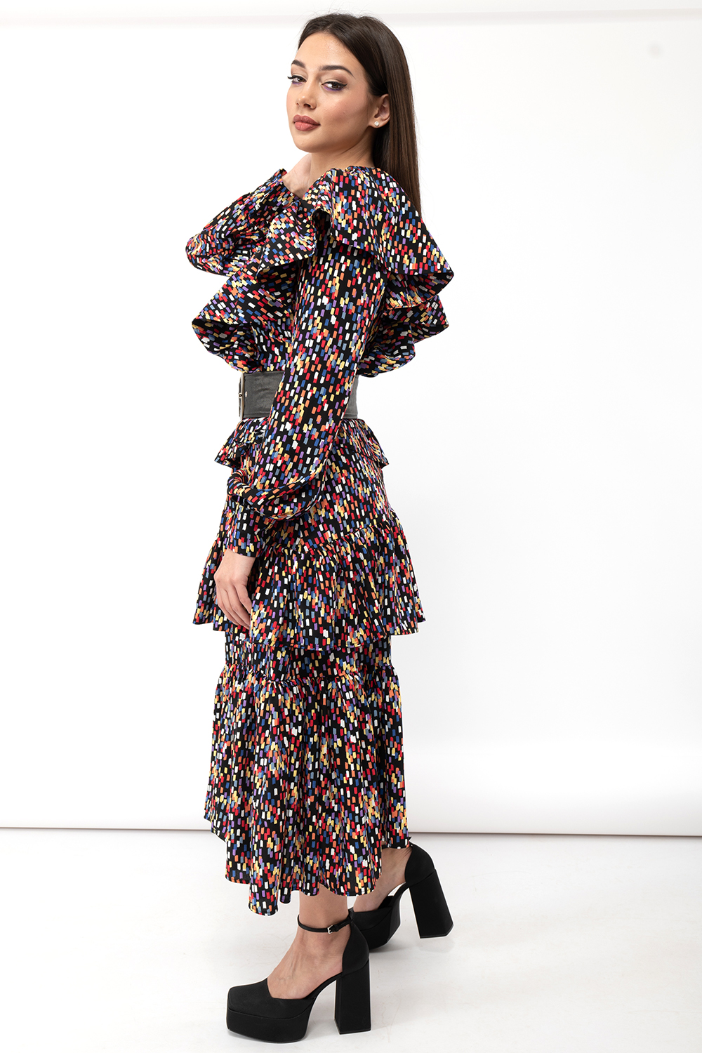 Vida dress is a ruffle-rich dress with a colorful print.