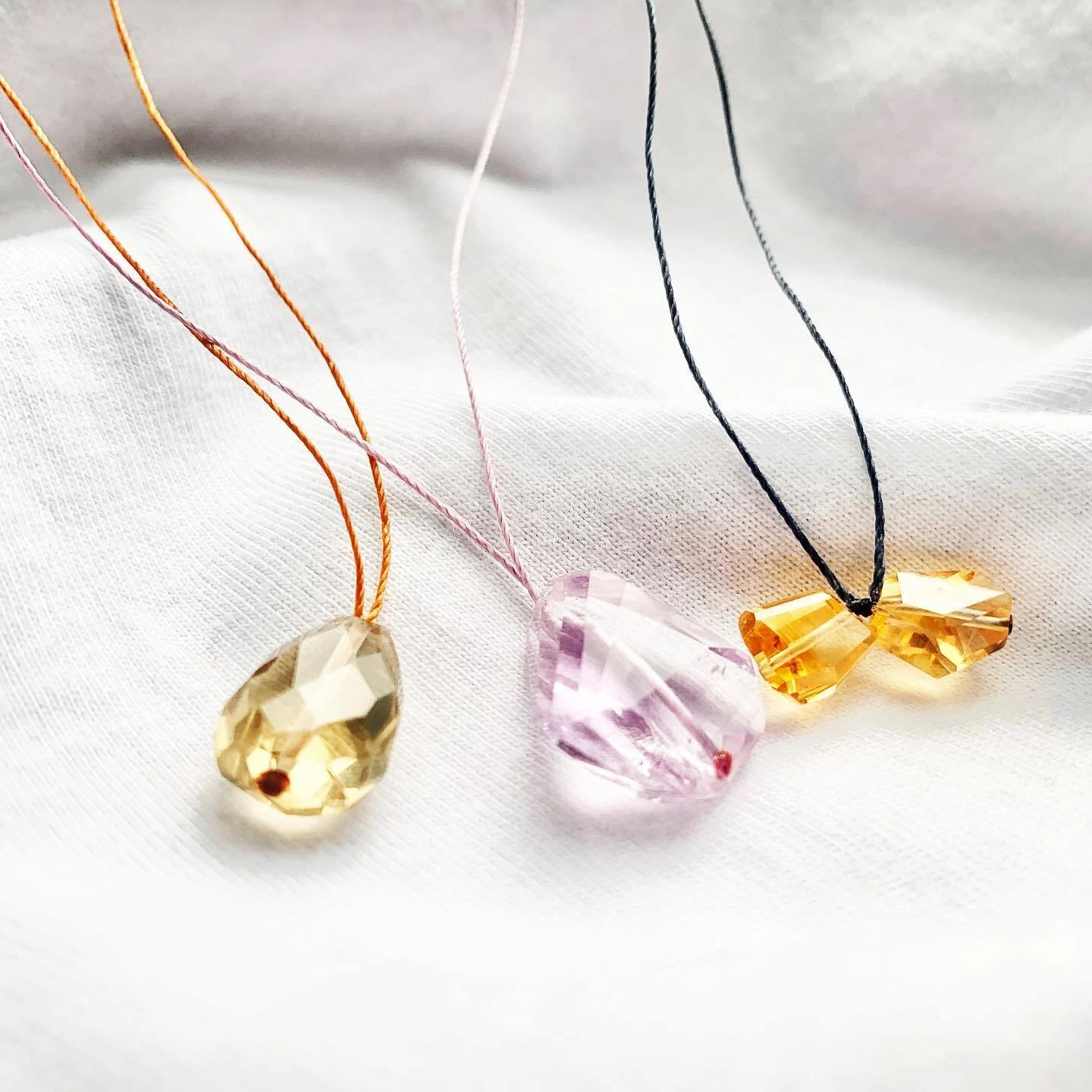 Handmade necklace featuring crystals in their most natural form - a choice of a single double terminated rock crystal or a nugget of purple amethyst, green amethyst or aquamarine - on a thin ("invisible") satin string. Silver clasp. — slika 4