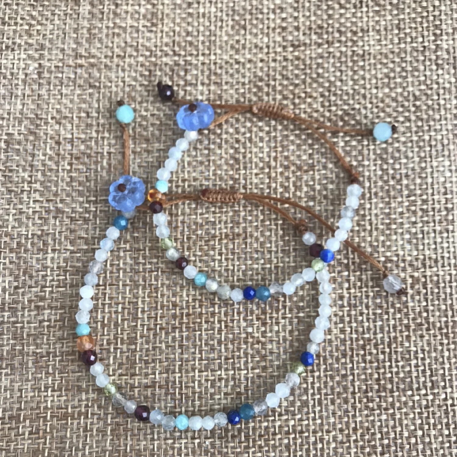 Handmade bracelet set with faceted gemstone beads - black spinel, African turquoise, mooonstone, lapis lazuli or a mix of them all (multigem) - strung on a quality satin string. Accented with a flower in different color. Adjustable length. — slika 2