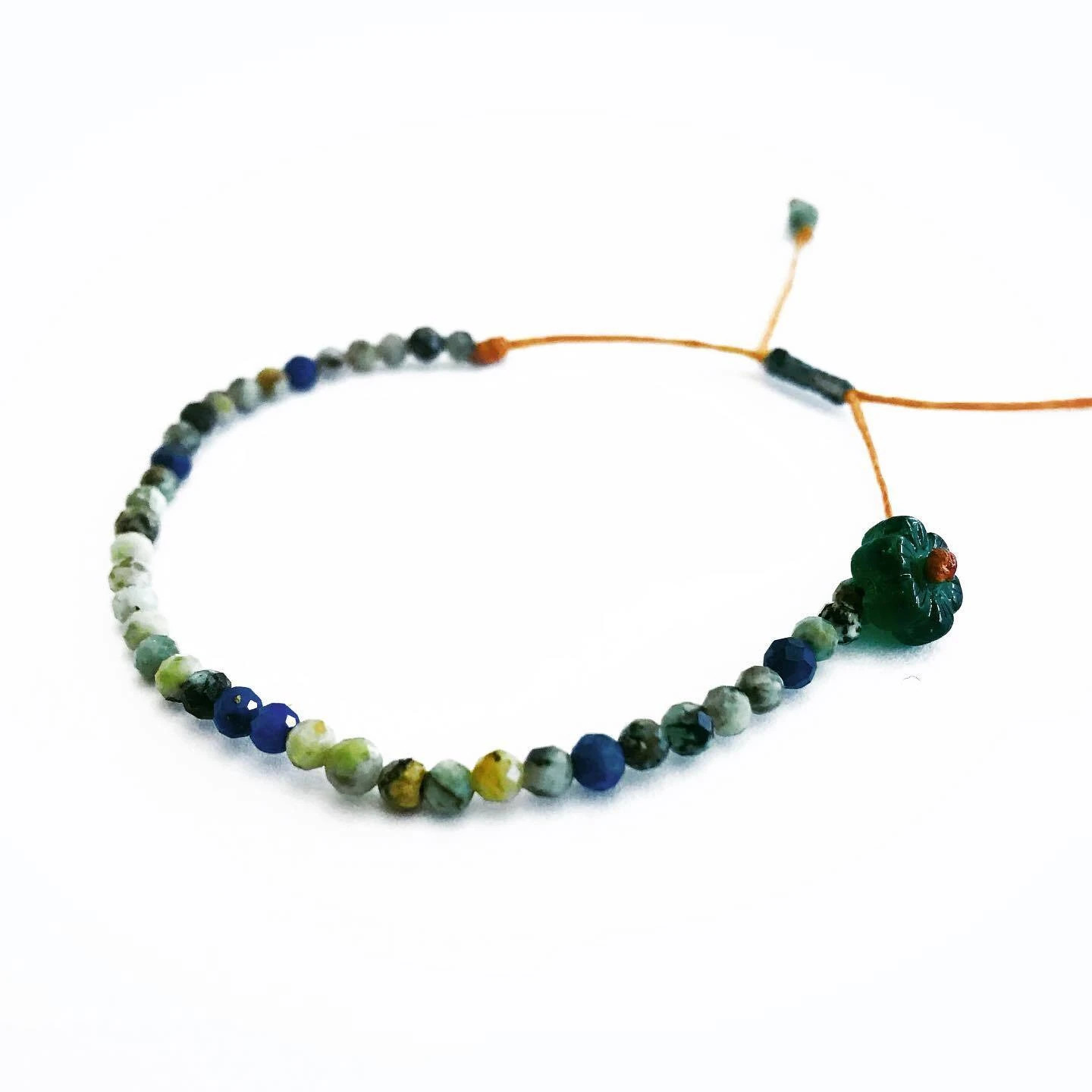Handmade bracelet set with faceted gemstone beads - black spinel, African turquoise, mooonstone, lapis lazuli or a mix of them all (multigem) - strung on a quality satin string. Accented with a flower in different color. Adjustable length. — slika 4